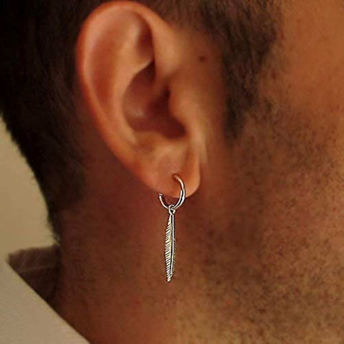 5 interesting reasons why men wear earrings