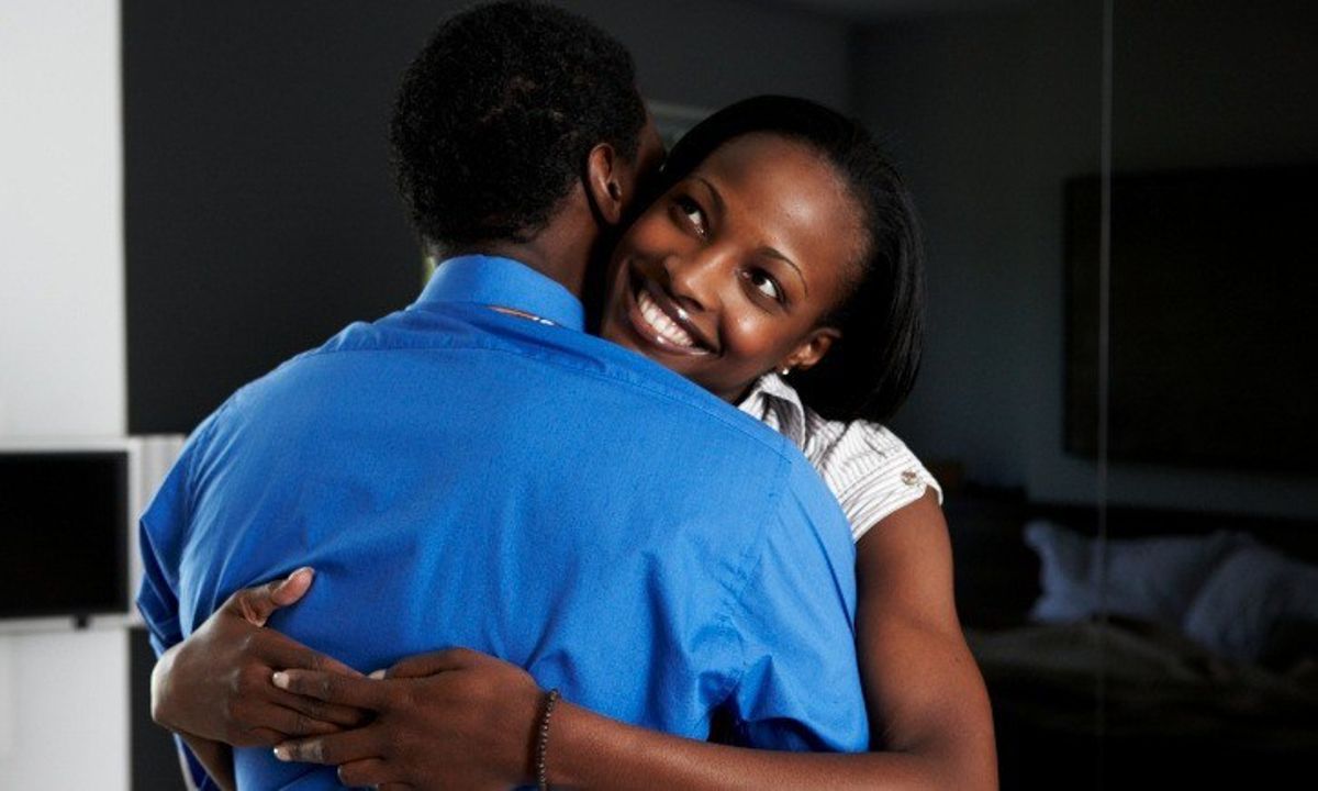 Image result for lady hugging a man kenya