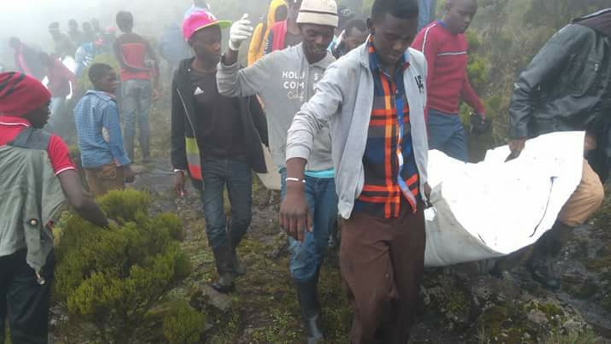 PHOTOS: Bodies from aircraft crash retrieved