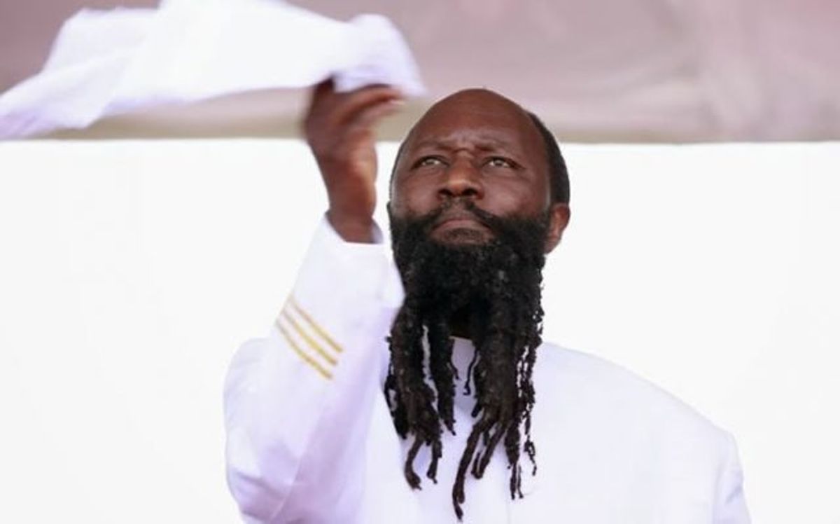 Image result for prophet owuor praying to a snake
