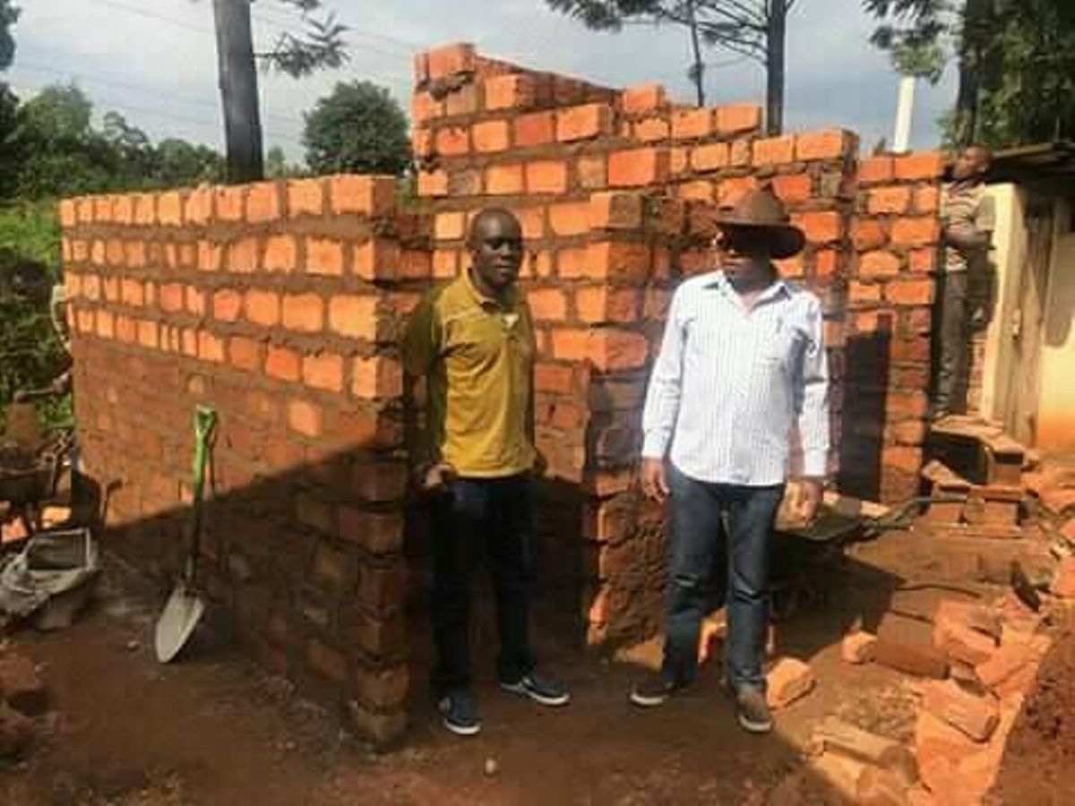 Well-wisher inspects ongoing construction of toilets at ...